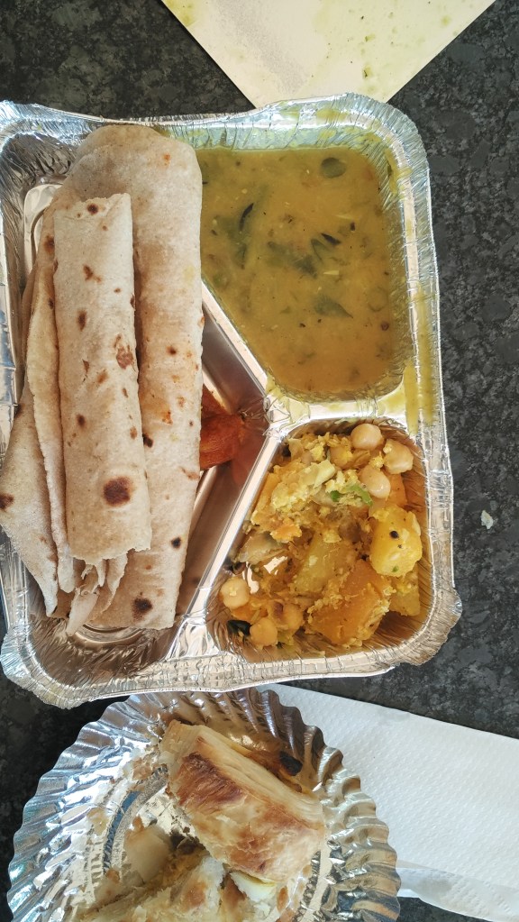 An Indian food thali with chapati and curries in a takeaway container, from a late lunch at the National Centre for Biological Sciences (NCBS), Bangalore.