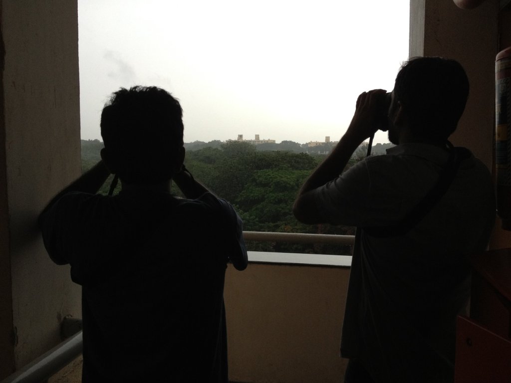 Dr. Amit Agrawal and Dr. Ashwin Viswanathan from the Centre for Ecological Sciences at IISc, Bengaluru, analyzing data together on a laptop in the lab.